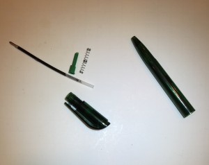 Take apart a a dried out pen or Sharpie. Keep the large tube. Discard the rest.